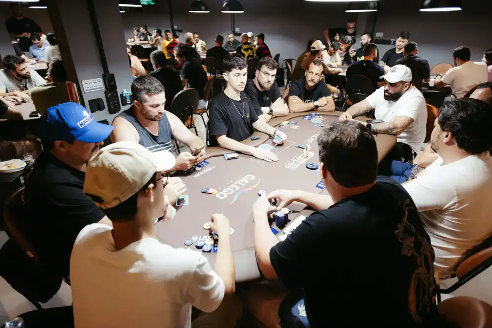Players focused on a trading card game match